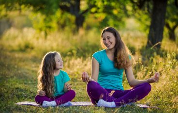 Try this Parent/Child Partner Yoga Sequence to Strengthen the Ties that Bond